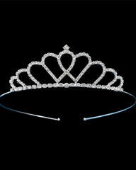 A silver-colored tiara adorned with cut crystals, designed for teen girls, against a black background.