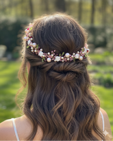 Woman with floral hair accessory in a park