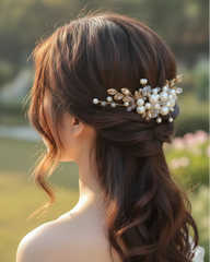 Woman with elegant hair styled with a decorative hairpiece against a blurred natural background